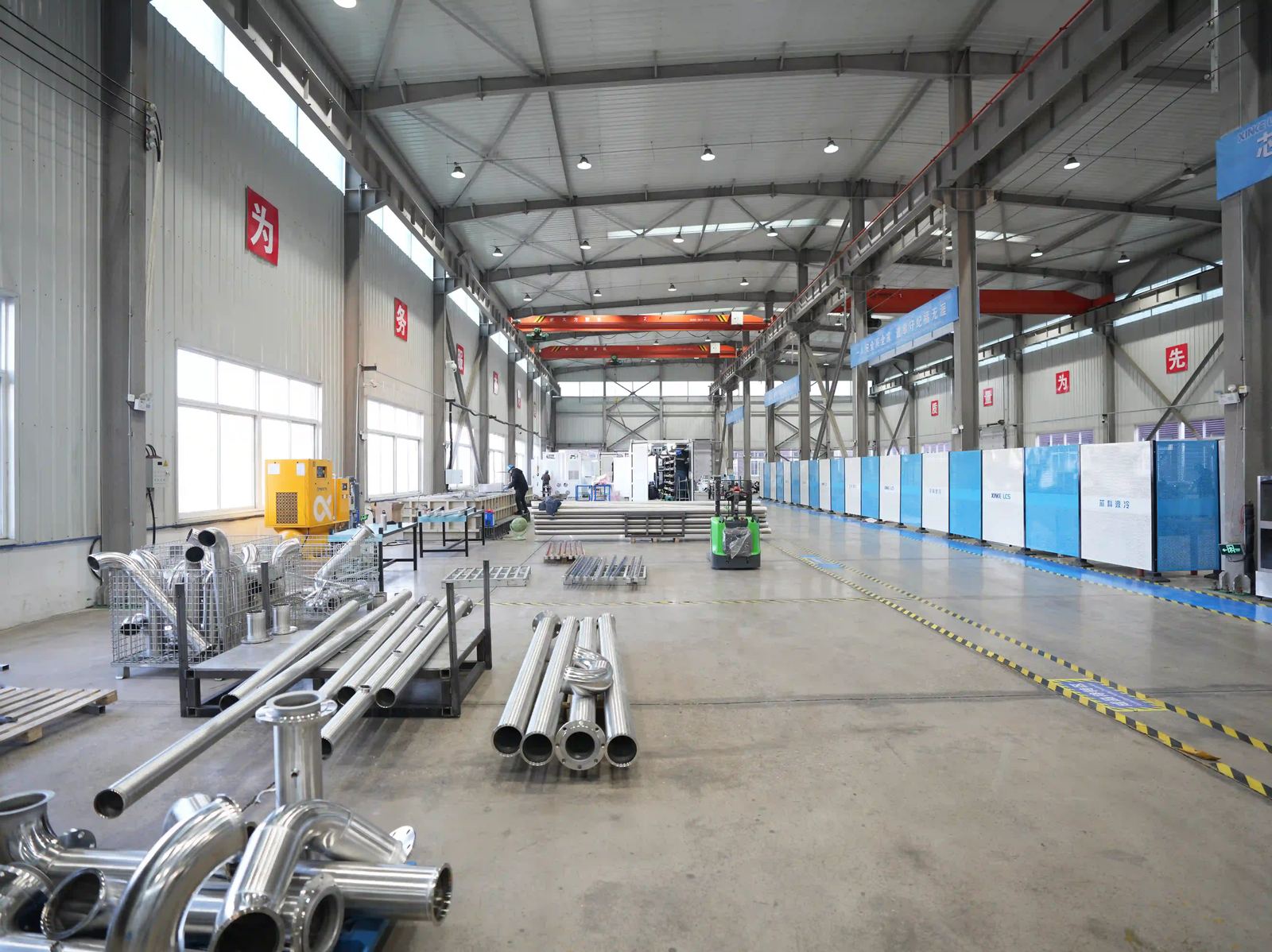 XINKE production base material preparation area with metal piping